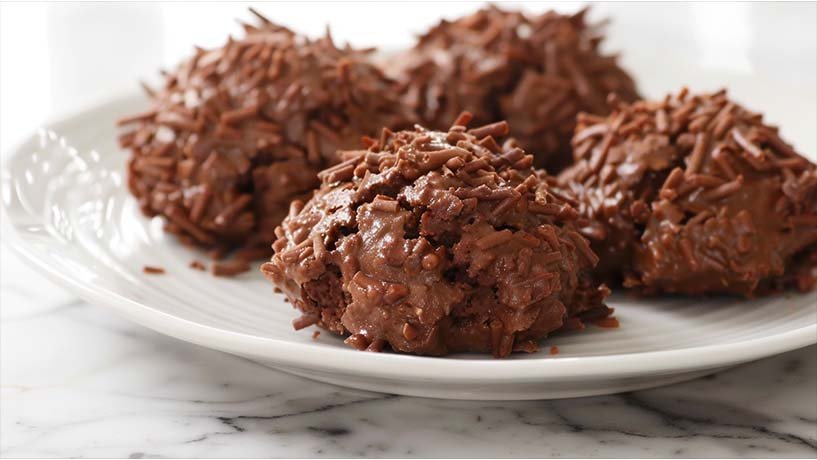 Chocolate Coconut Macaroons on a white plate